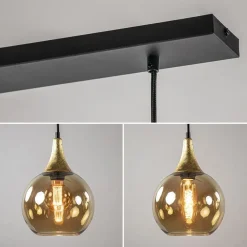 Chique 3-lichts hanglamp zwart/goud met amber glas></noscript>Straluma Best