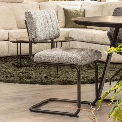 Grijze eetkamerstoel met zwart frame><noscript><img width=