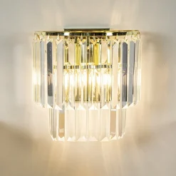 Klassieke wandlamp goud met helder glazen pegels></noscript>Straluma Online