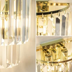 Klassieke wandlamp goud met helder glazen pegels></noscript>Straluma Online