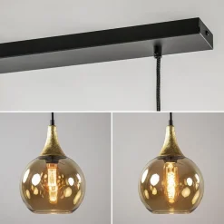4-Lichts eettafelhanglamp zwart/goud met amber glazen bollen><noscript><img width=