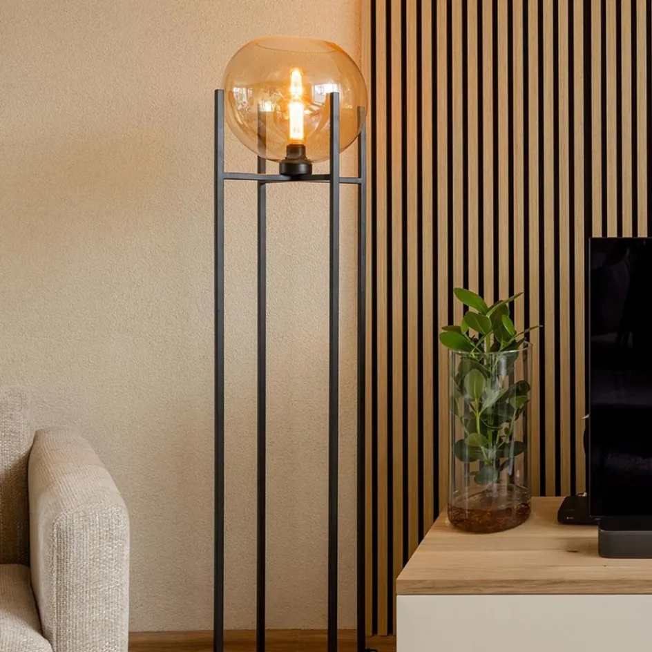 Vloerlamp zwart + amber glazen bol>Straluma Outlet
